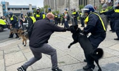 Police with dogs intervene after far-right protesters clashed with officers in Plymouth.