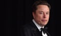 A man wearing a tuxedo looks ahead