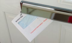A British Gas letter dropping through a letterbox