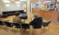 Patients wait for their appointments at a GP surgery in London.