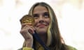 Yaroslava Mahuchikh shows off her Olympic gold medal