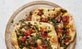 Versatility is king: Yotam Ottolenghi’s olive oil flatbread can take on all kinds of toppings and flavourings like garlic butter and grated tomatoes.