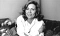 black and white photo of a woman in a white shirt