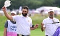 Spain's Jon Rahm salutes the crowd after completing his third round at Le Golf National.