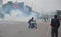 Police fire teargas during a protest in Abuja