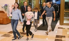 President Putin greets Russians returning to Moscow after prisoner Artyom Dultsev, Anna Dultseva and their children, followed by the Russian president, Vladimir Putin