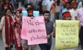Teaching staff from the Bangladesh University of Engineering and Technology show support for the student protesters. One placard reads 'We stand with our students' and another reads 'Every lie is a debt to the truth. Sooner or later the debt is paid'