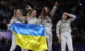 Olga Kharlan, Alina Komashchuk, Olena Kravatska and Yuliia Bakastova of Ukraine celebrate after winning the gold.