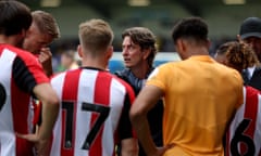 Head Coach, Thomas Frank of Brentford talks to his players during the Pre-Season Friendly match between AFC Wimbledon and Brentford at The Cherry Red Records Stadium on July 20, 2024 in London, England. 