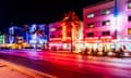 Nightlife at Ocean Drive with neon-coloured art deco hotels, South Beach, Miami, USA